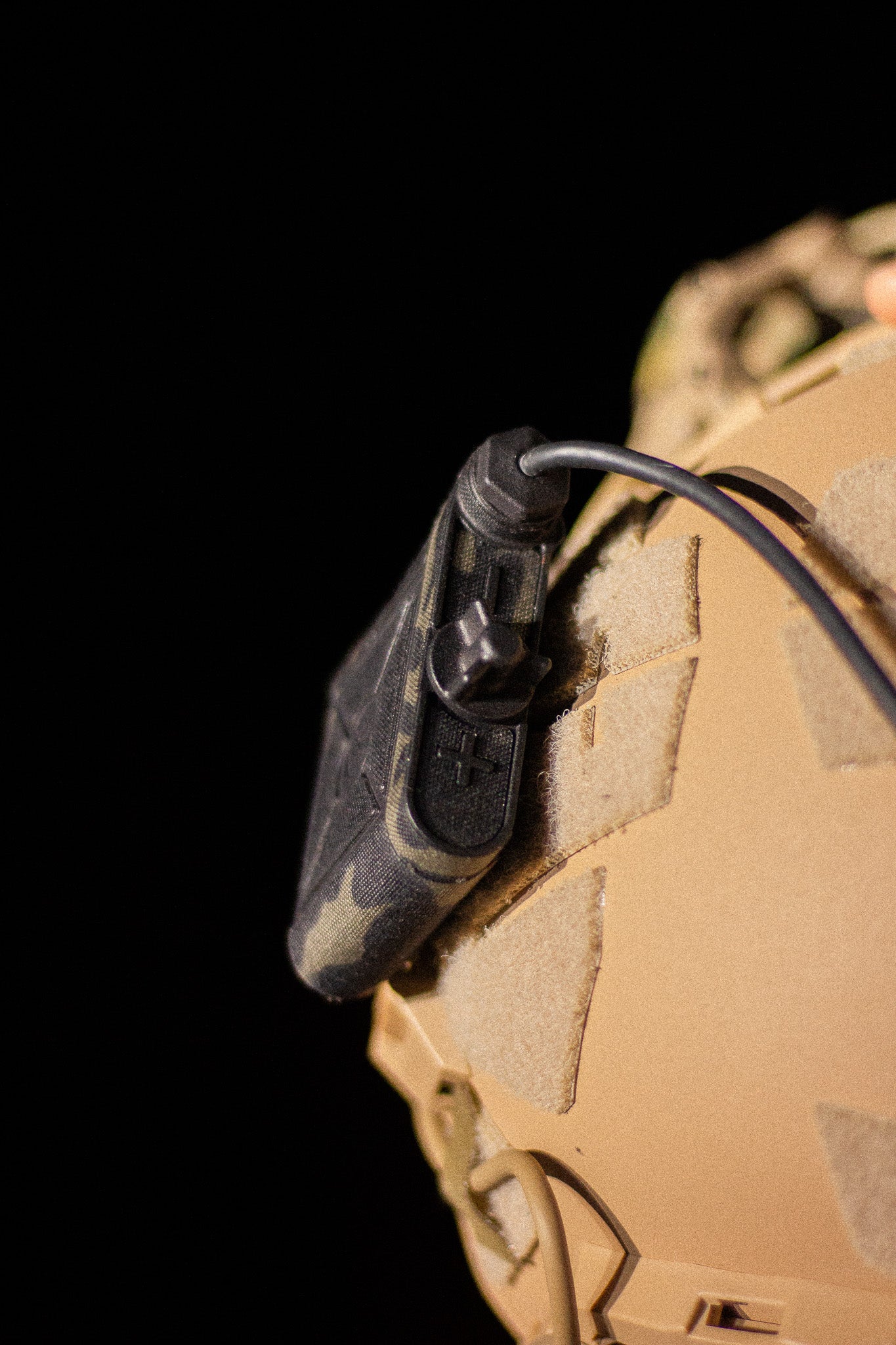 LLUL-21 night vision device battery pack with Multicam Black K.wrap mil‑spec Cordura camo and 3M adhesive for IR resistance & concealment