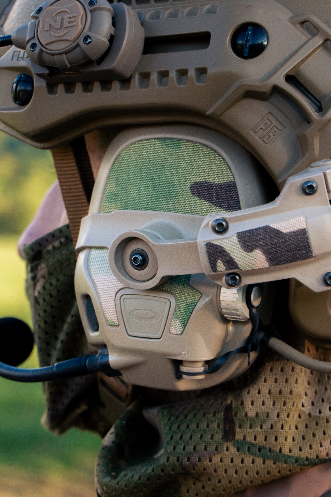 OpsCore AMP headset with Multicam K.wrap mil‑spec Cordura camo and 3M adhesive for IR resistance & concealment