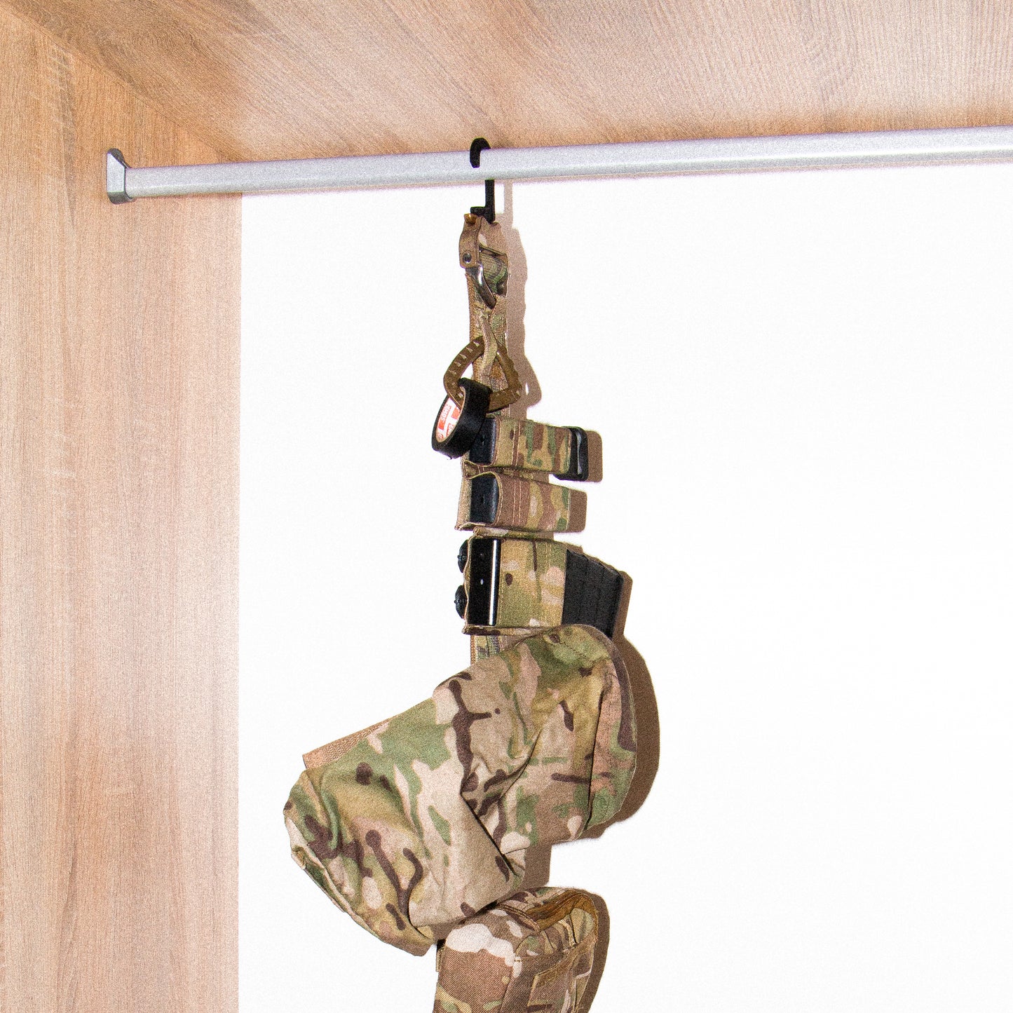 A black shooters belt hanger surface below.
