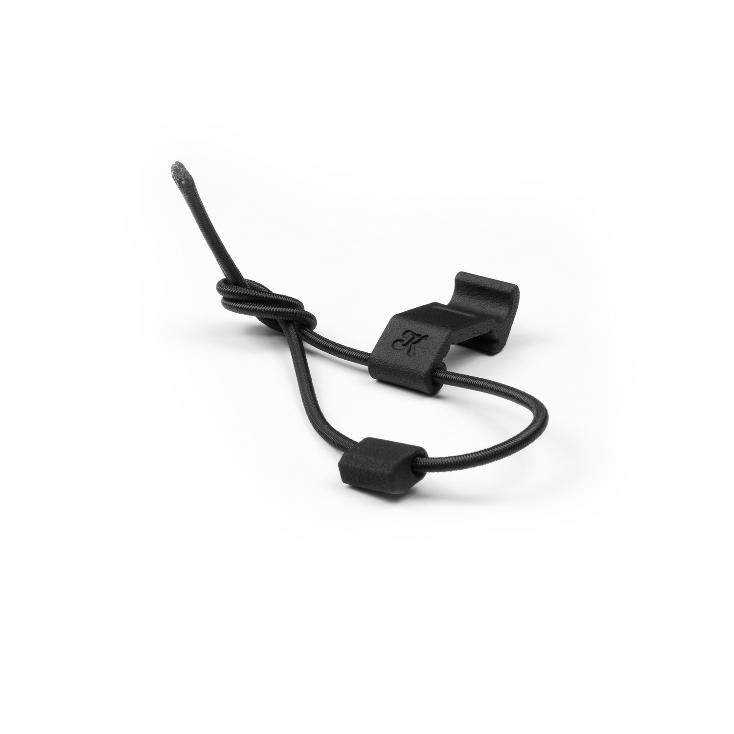 A black bungee cord sling system designed to be mounted on a Picatinny rail for stowing and deploying a sling.