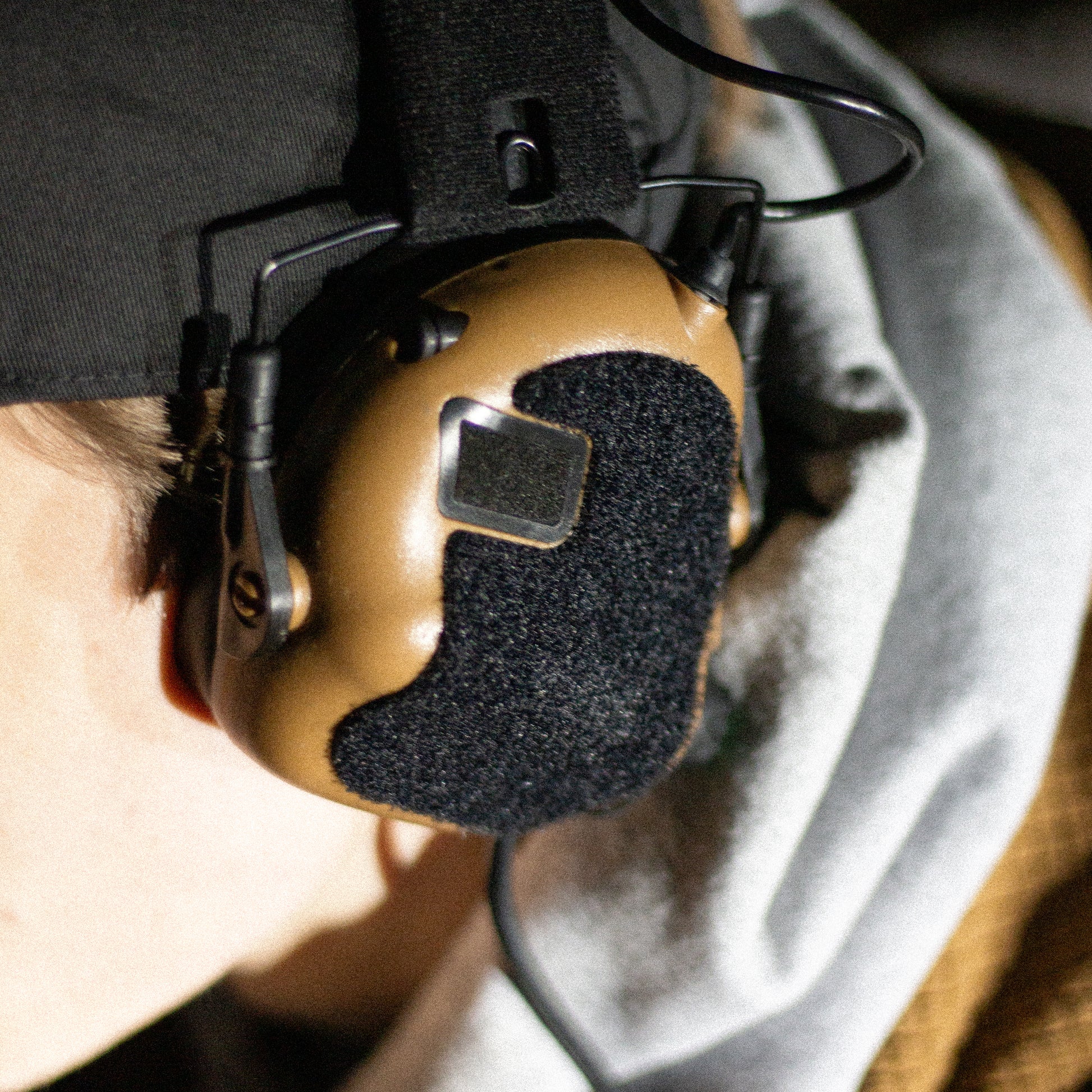 Earmor M31/M32 headset with black K.fluffs - Velcro loop cutouts, Mil‑Spec Cordura & 3M adhesive 