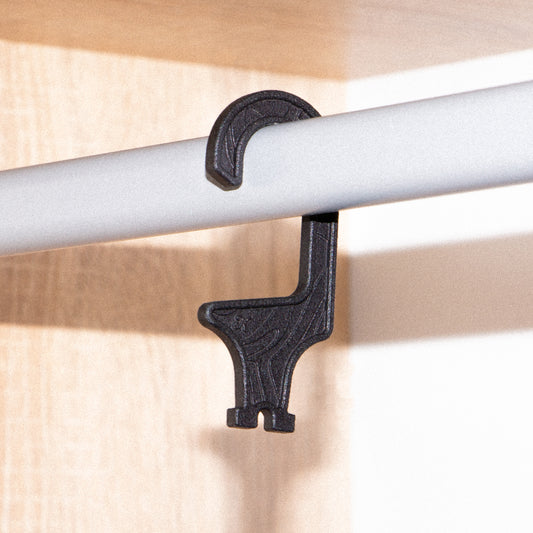 A black shooters belt hanger surface below.